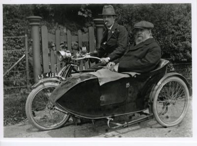 Motor cycle and side car. -
